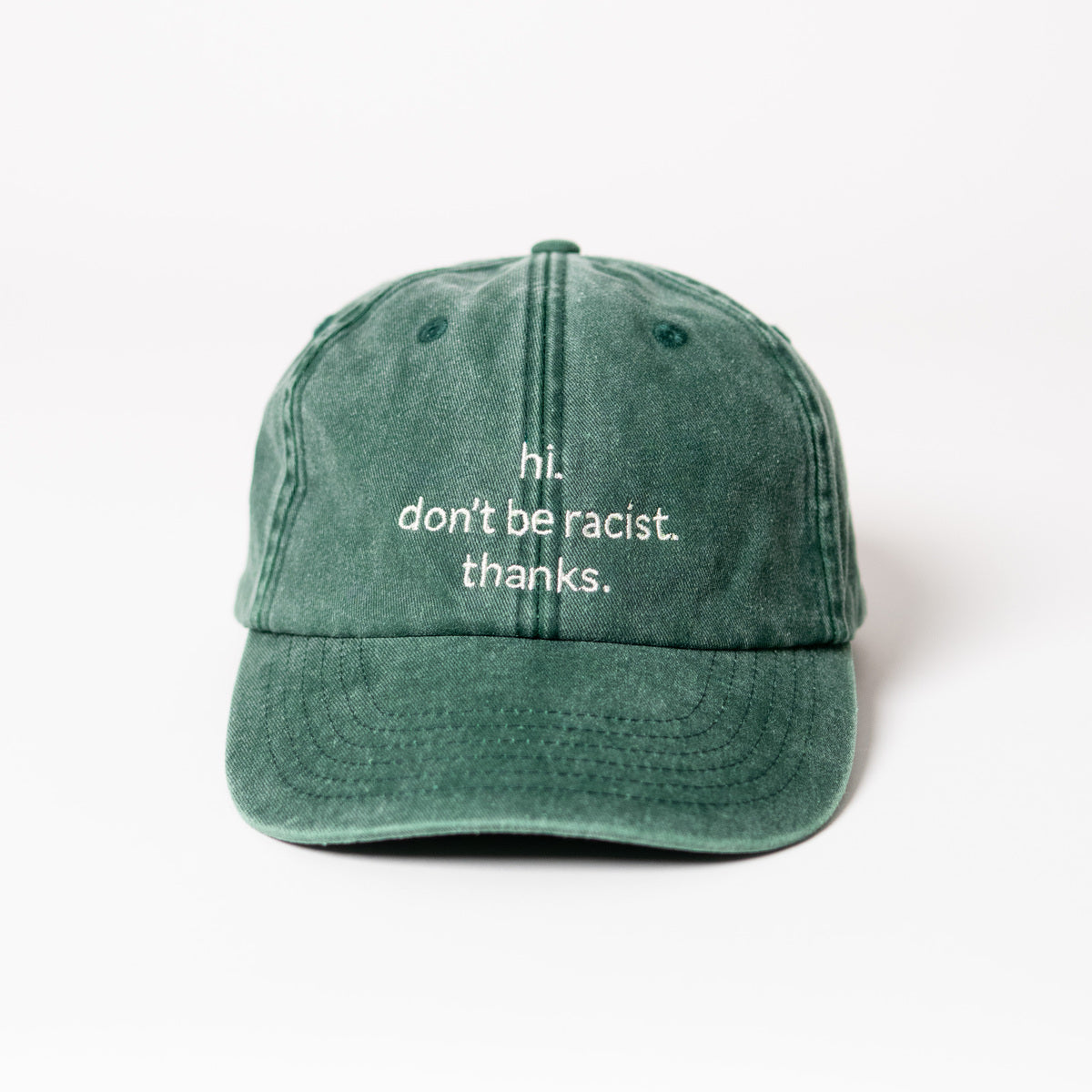 hi. don't be racist. thanks. dad cap in vintage green von arrel