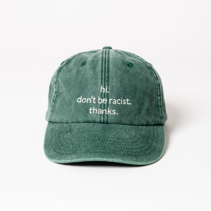 hi. don't be racist. thanks. dad cap in vintage green von arrel