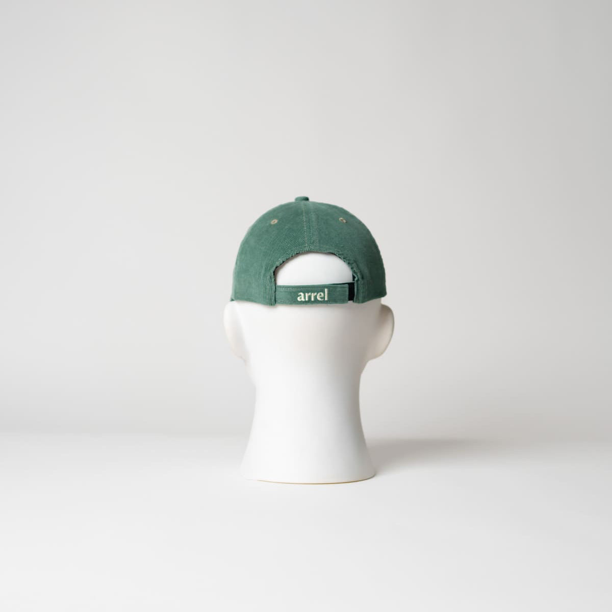 Verschluss der ciao ragazzi Cord Cap in grün mit beiger Schrift