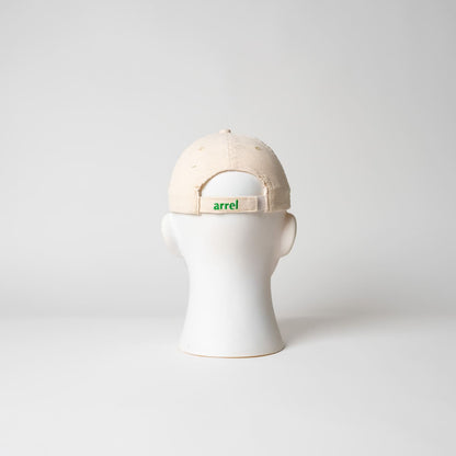 Verschluss der ciao ragazzi Cord Cap in beige mit grünem Design von arrel