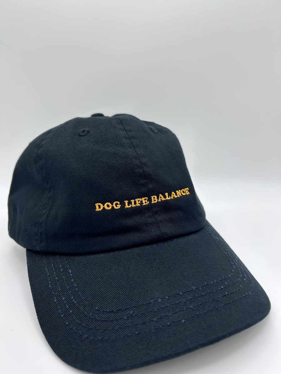 dog life balance organic dad cap von arrel in schwarz und orange von schräg vorne