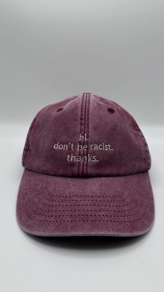 hi. don't be racist. thanks. cap in vintage red mit beiger Schrift
