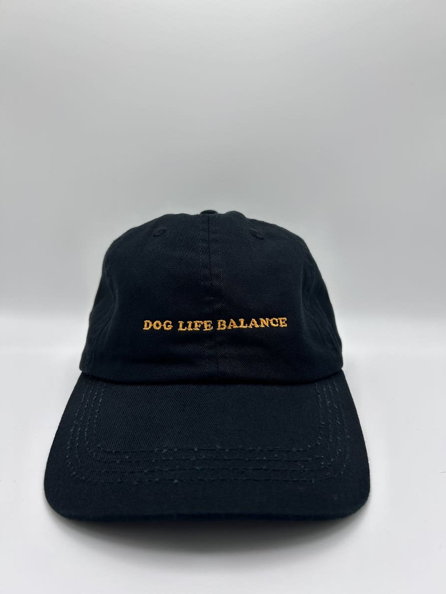 Dog Life Balance organic dad cap von arrel in schwarz mit orangefarbener Schrift