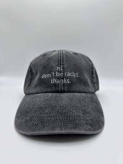 hi don't be racist cap von arrel in vintage black mit silberner Schrift